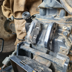 Broken cast steel implement mount on tractor 3