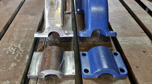 Fabrication - A cast iron feed tube support bracket 
